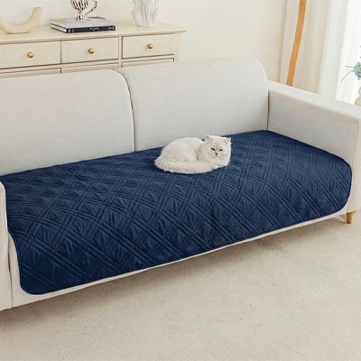 chat blanc sur Protection canapé Chat bleu marine