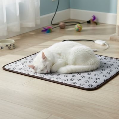   Tapis pour chat branché avec chat blanc qui dort
